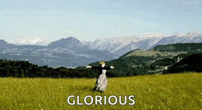 Woman Dancing In Field With Glorious GIF