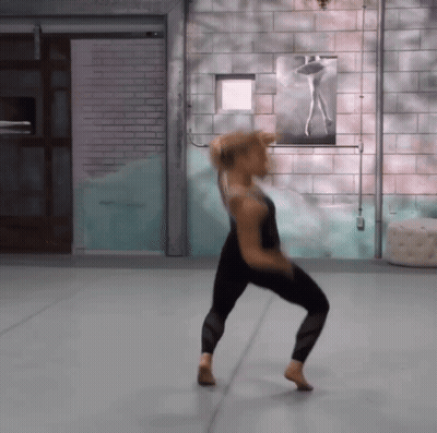 Woman Dancing In Front Of Ballerina Painting GIF