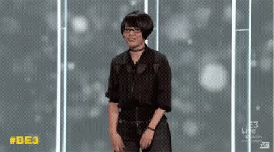 Woman Dancing In Front Of Be3 Screen GIF