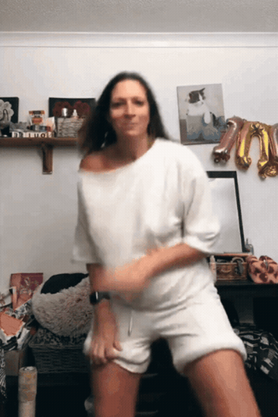 Woman Dancing In Front Of Bitch Sign GIF