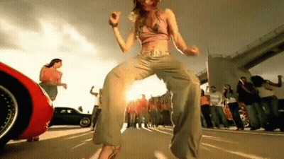 Woman Dancing In Front Of Crowd GIF