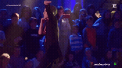 Woman Dancing In Front Of Crowd GIF