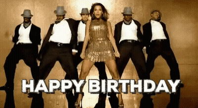 Woman Dancing In Front Of Men Says Happy Birthday GIF