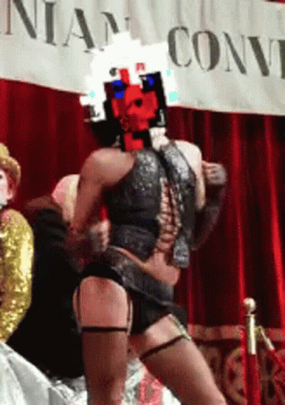 Woman Dancing In Front Of Nia Convention Sign GIF