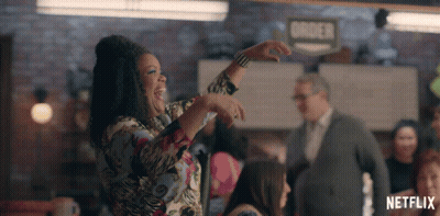Woman Dancing In Front Of Order Sign GIF