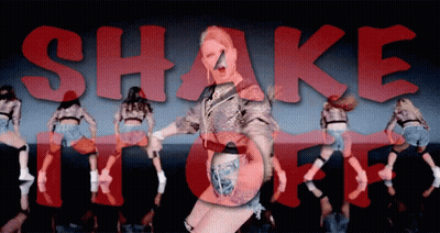 Woman Dancing In Front Of Shake It Off Sign GIF