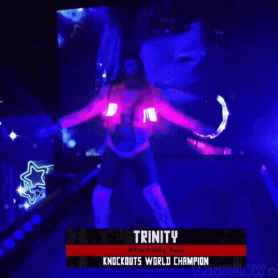 Woman Dancing In Front Of Trinity Screen GIF