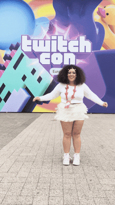Woman Dancing In Front Of Twitch Con Sign GIF
