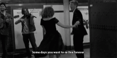 Woman Dancing In Front Of Violin And Guitar Players GIF