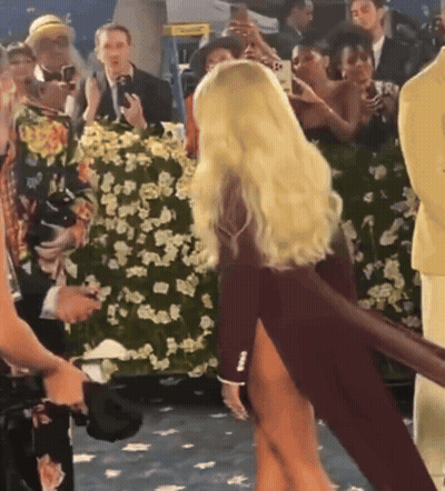 Woman Dancing In High Slit Dress GIF