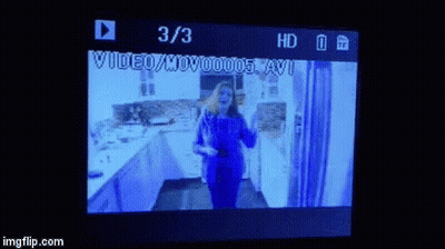 Woman Dancing In Kitchen With 3/3 On Screen GIF