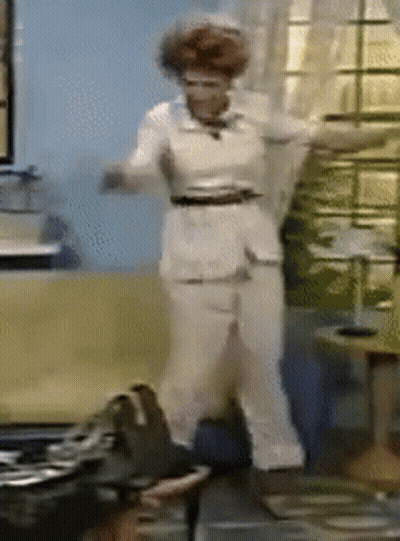 Woman Dancing In Living Room In Front Of Window GIF