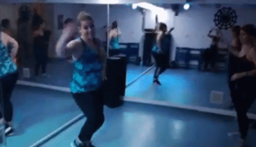 Woman Dancing In Mirror GIF