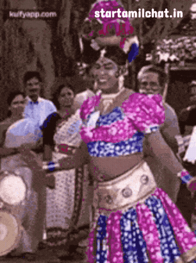 Woman Dancing In Pink And Blue Dress GIF