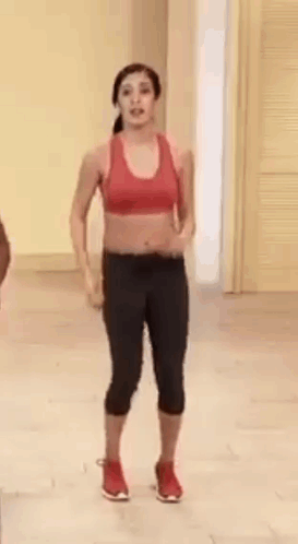 Woman Dancing In Red Sports Bra Black Leggings GIF
