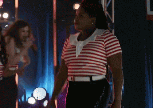 Woman Dancing in Red White and Blue Stripes