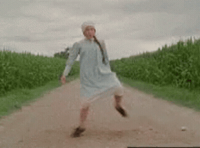 Woman Dancing In White Dress GIF