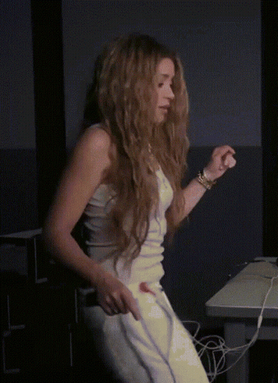Woman Dancing In White Tank Top And Pants GIF