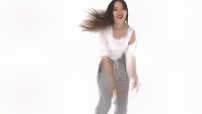 Woman Dancing In White Top And Gray Pants GIF