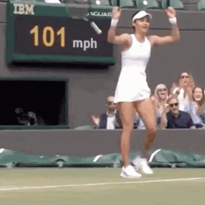 Woman Dancing On Tennis Court Holding Racket GIF