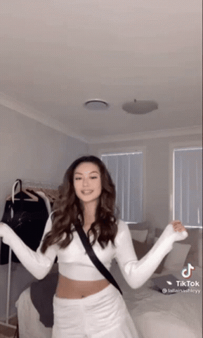 Woman Dancing With Arms Outstretched GIF