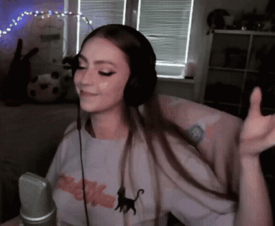 Woman Dancing With Cat Shirt And Headphones Microphone GIF