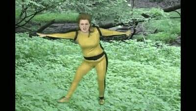 Woman Dancing With Crossed Legs In Crop Top GIF