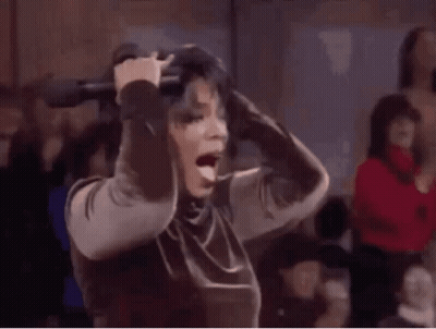 Woman Dancing With Hands In The Air At Club GIF