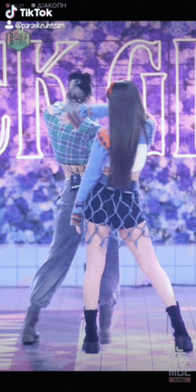 Woman Dancing With Man In Plaid Shirt GIF