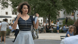 Woman Doing Finger Guns GIF