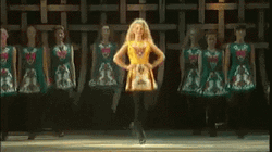 Woman Doing Irish Jig With Backup Dancers GIF