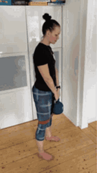 Woman Doing Lightweight Deadlift Workout GIF