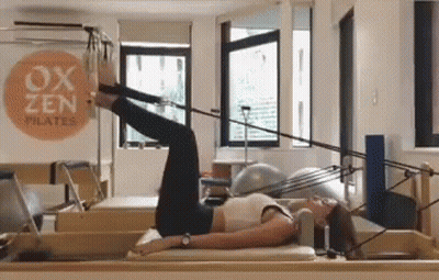 Woman Doing Pilates On Machine GIF