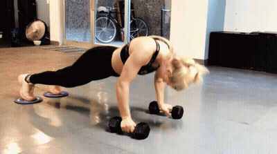 Woman Doing Push Ups Holding Dumbbells GIF
