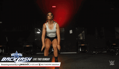 Woman Doing Push Ups In Front Of Backlash Sign GIF