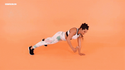 Woman Doing Push Ups Wearing Sports Bra Orange GIF