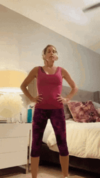 Woman Doing Squat Jump For Good Morning Exercise GIF