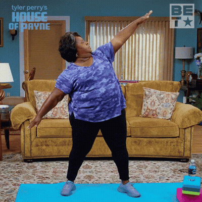 Woman Doing Yoga On Blue Mat GIF