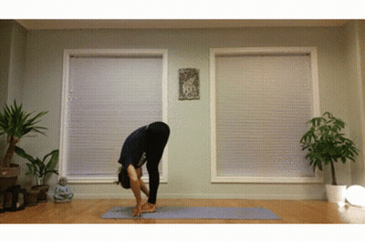 Woman Doing Yoga Pose On Mat GIF