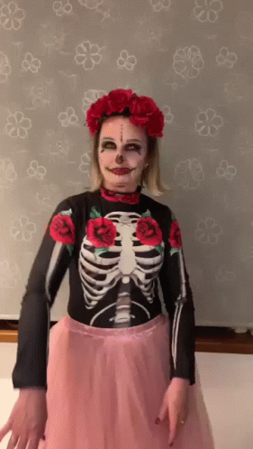 Woman Dressed As Day Of The Dead Skeleton GIF