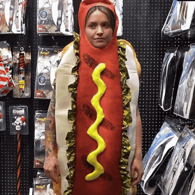 Woman Dressed As Hot Dog With Mustard GIF