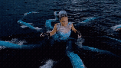 Woman Dressed As Octopus Swimming GIF