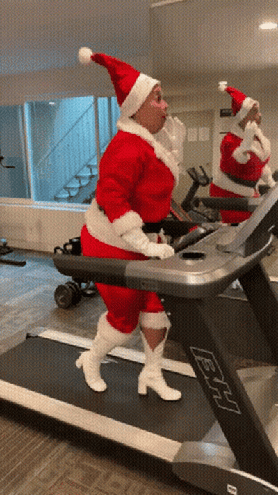 Woman Dressed as Santa Claus on BH Treadmill