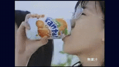 Woman Drinking Fanta Orange Soda GIF