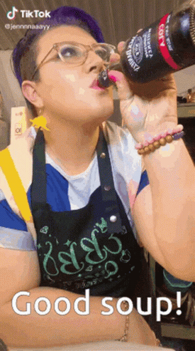 Woman Drinking From Bottle Saying Good Soup GIF