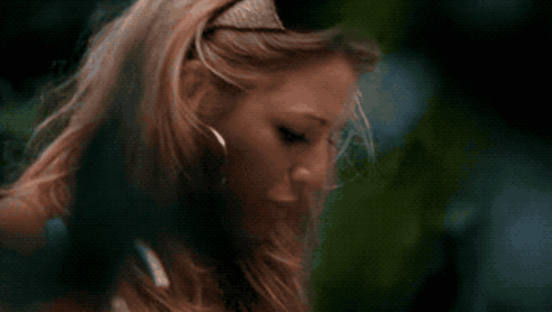 Woman Drinking From Bottle With Tongue Out GIF