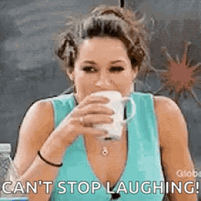 Woman Drinking From Cup And Laughing GIF