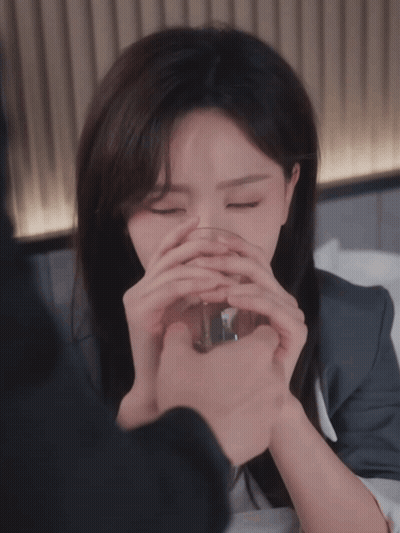 Woman Drinking From Glass Eyes Closed GIF