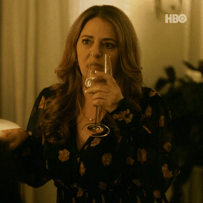 Woman Drinking From Glass With HBO GIF