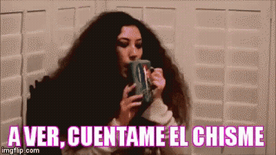 Woman Drinking From Mug Saying A Ver Cuentame El Chisme GIF